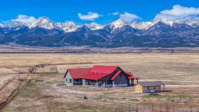 mountain view featuring a rural view