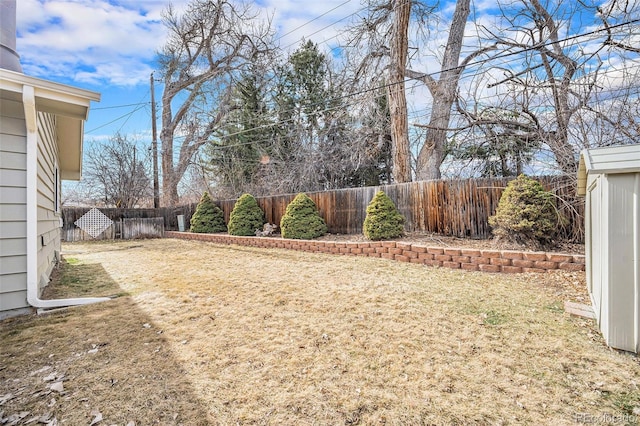 view of yard featuring a fenced backyard