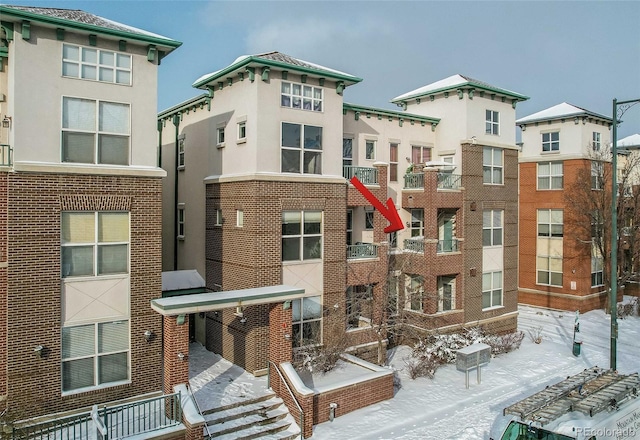 view of snow covered building