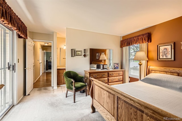 9925 W Progress Pl, Littleton, CO 80123 - bedroom featuring light carpet and access to outside