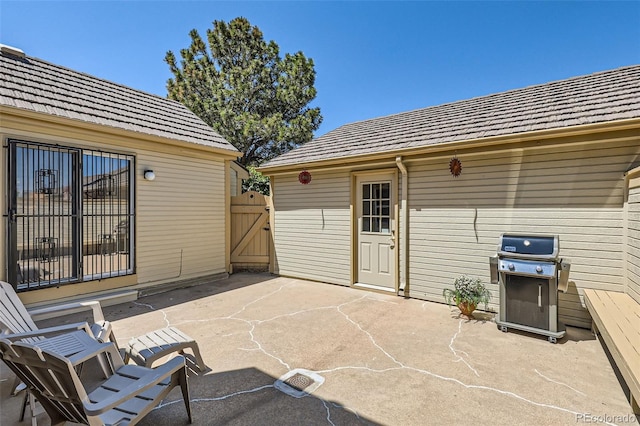9925 W Progress Pl, Littleton, CO 80123 - view of patio with area for grilling and a gate