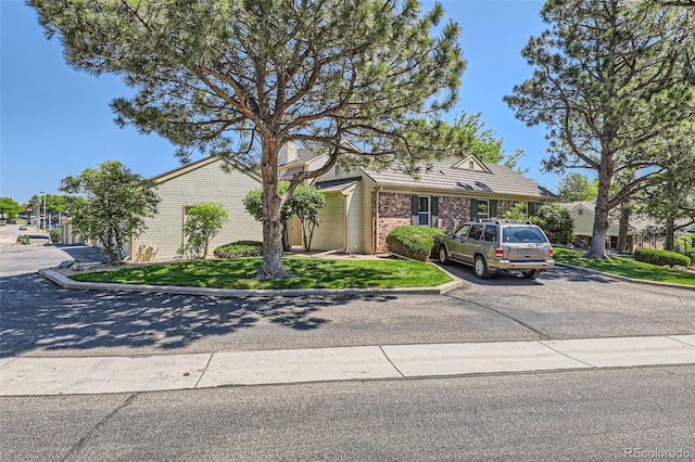 9925 W Progress Pl, Littleton, CO 80123 - view of front of home featuring a front lawn