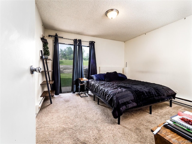 14590 E 2nd Ave Unit 105B, Aurora, CO 80011 - bedroom with light carpet and a textured ceiling