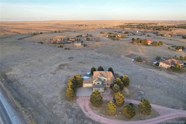 aerial view at dusk with a rural view