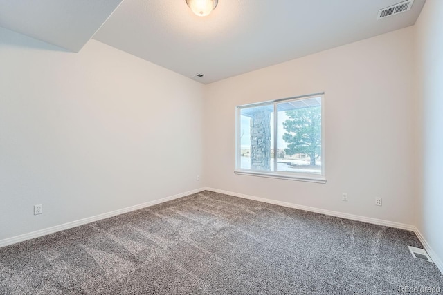 unfurnished room featuring carpet floors