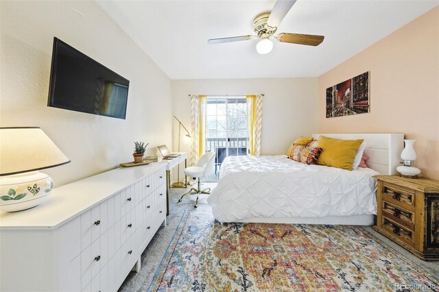 carpeted bedroom with a ceiling fan