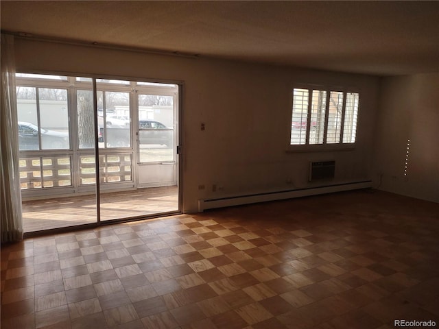 interior space featuring a water view and a baseboard radiator