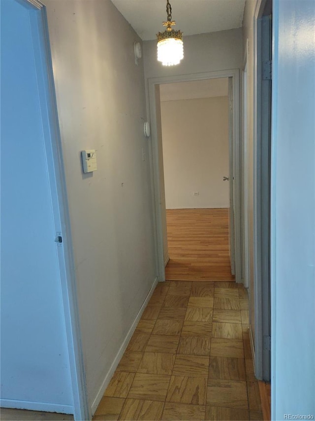 hallway with light parquet floors