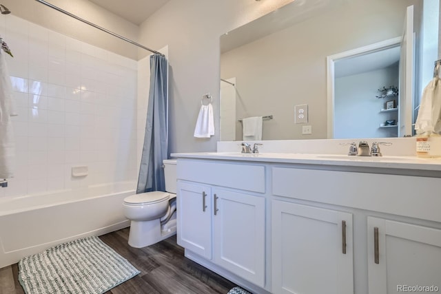 full bathroom featuring shower / tub combo, vanity, toilet, and hardwood / wood-style floors