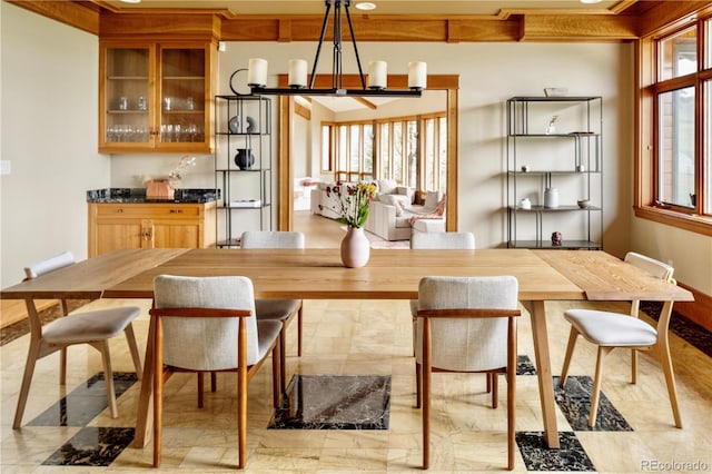 6455 Dakota Ridge Dr, Golden, CO 80403 - dining space featuring a chandelier and baseboards