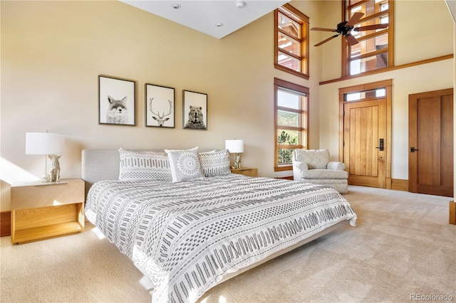 6455 Dakota Ridge Dr, Golden, CO 80403 - carpeted bedroom with a towering ceiling and baseboards