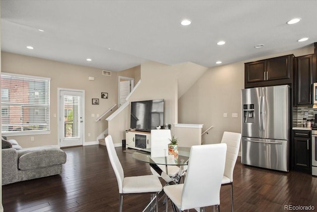 2521 Moline St, Aurora, CO 80010 - dining area with dark wood-style floors, recessed lighting, stairs, and baseboards