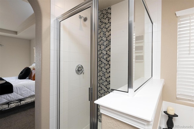 bathroom with an enclosed shower