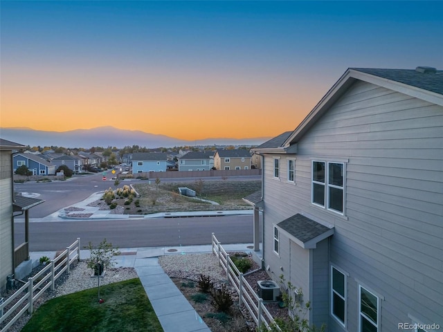 view of property exterior at dusk