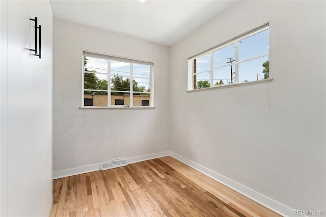 1579 Fairfax St, Denver, CO 80220 - spare room with baseboards and wood finished floors
