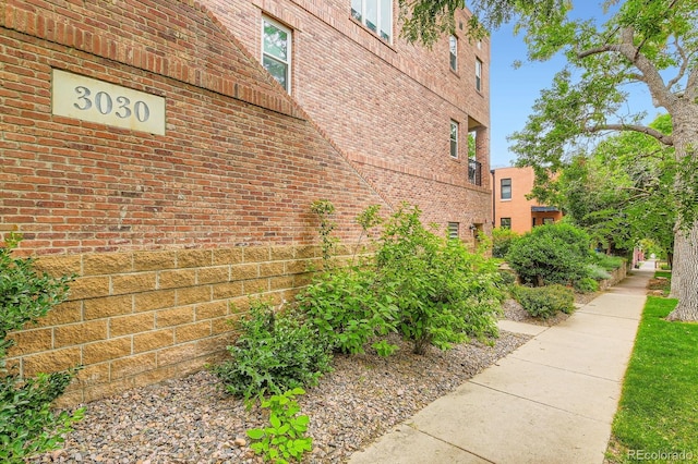 3030 Wyandot St Unit 7, Denver, CO 80211 - view of side of home with brick siding