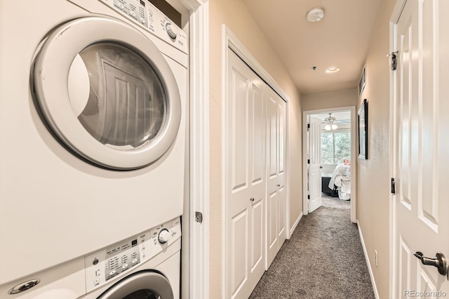3030 Wyandot St Unit 7, Denver, CO 80211 - laundry room featuring stacked washer and clothes dryer, dark colored carpet, and recessed lighting