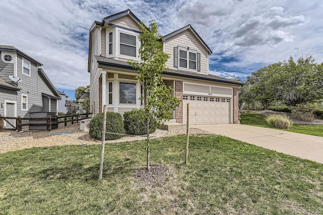 view of front of property featuring a garage and a front lawn