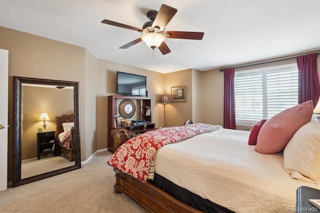carpeted bedroom with a ceiling fan