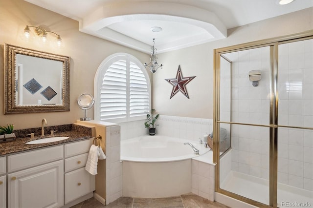 full bath featuring tile patterned floors, a shower stall, a garden tub, and vanity