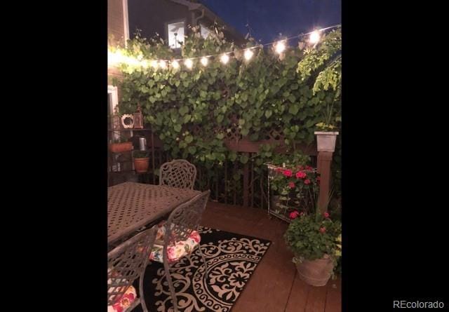 patio at twilight with outdoor dining area