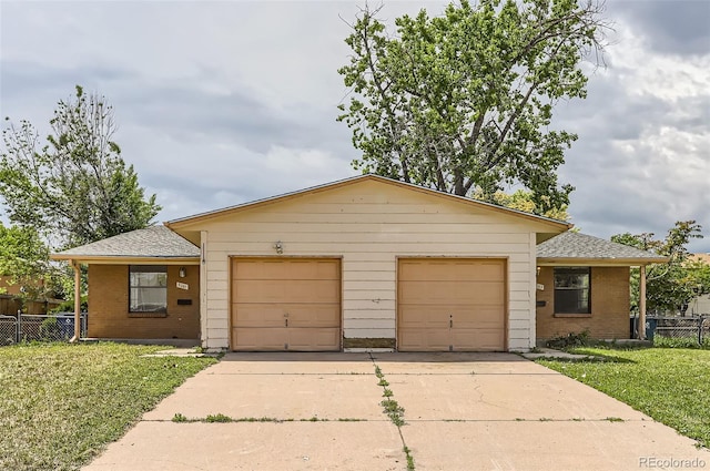 9061 Osceola St, Westminster, CO 80031 - single story home with an attached garage, concrete driveway, brick siding, and roof with shingles