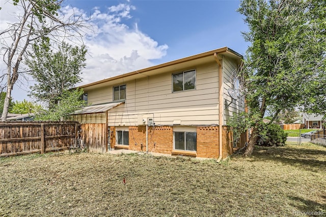 9061 Osceola St, Westminster, CO 80031 - rear view of property featuring brick siding