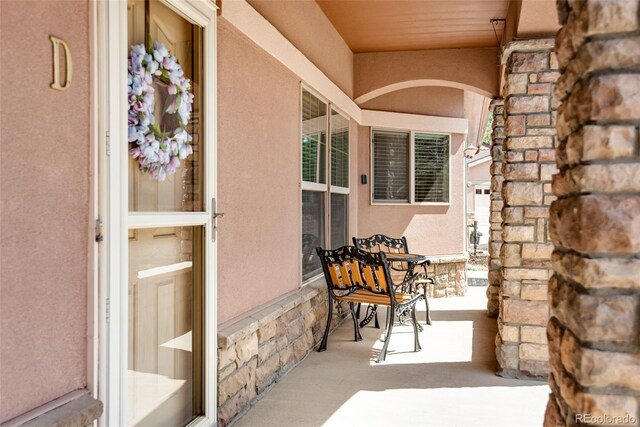 15501 E 112th Ave Unit 33D, Commerce City, CO 80022 - view of patio with a porch