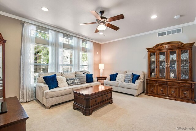 15501 E 112th Ave Unit 33D, Commerce City, CO 80022 - living room with visible vents, crown molding, ceiling fan, and carpet floors