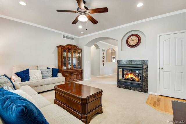 15501 E 112th Ave Unit 33D, Commerce City, CO 80022 - living room with visible vents, baseboards, ceiling fan, recessed lighting, and arched walkways