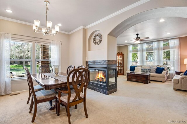 15501 E 112th Ave Unit 33D, Commerce City, CO 80022 - dining space featuring crown molding, recessed lighting, and light carpet
