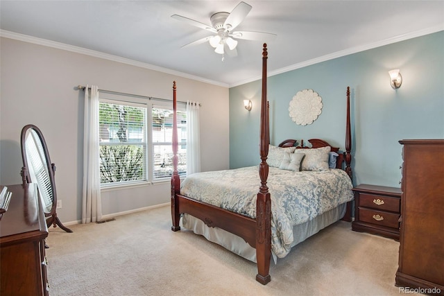 bedroom with crown molding, carpet floors, baseboards, and a ceiling fan