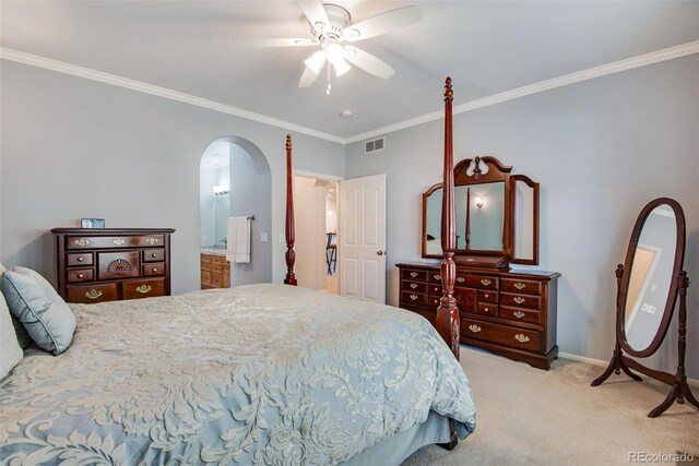 15501 E 112th Ave Unit 33D, Commerce City, CO 80022 - bedroom with visible vents, arched walkways, baseboards, ornamental molding, and carpet flooring