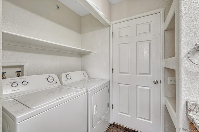 5255 Memphis St Unit 1009, Denver, CO 80239 - laundry room featuring washer and clothes dryer and a textured wall