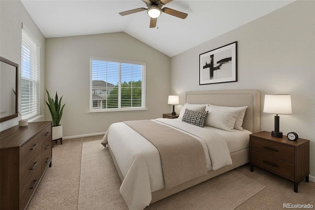 5255 Memphis St Unit 1009, Denver, CO 80239 - bedroom with multiple windows, light carpet, lofted ceiling, and ceiling fan