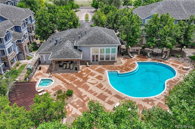 5255 Memphis St Unit 1009, Denver, CO 80239 - community pool featuring a patio area and french doors