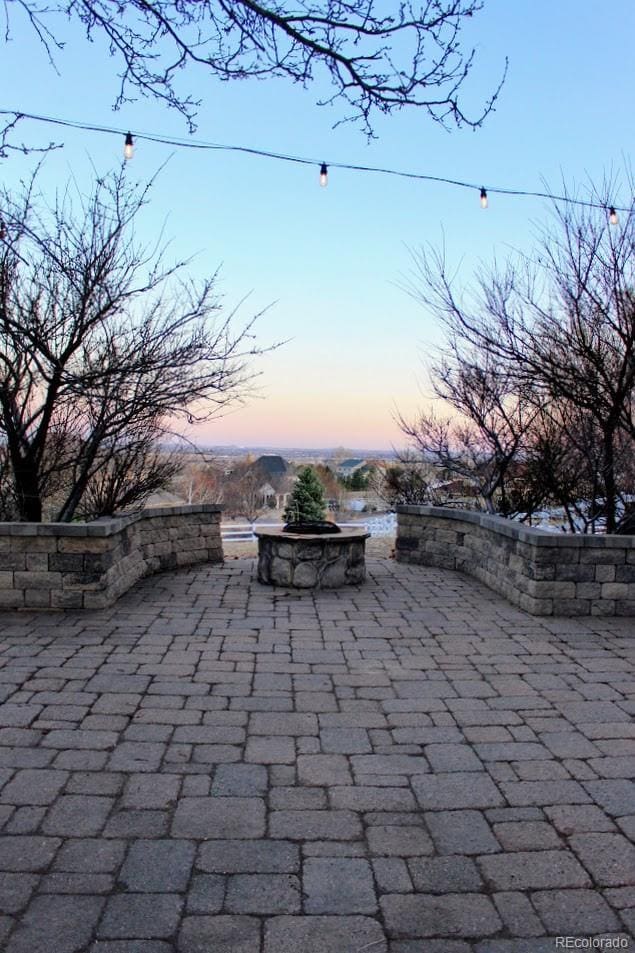 view of patio featuring a fire pit