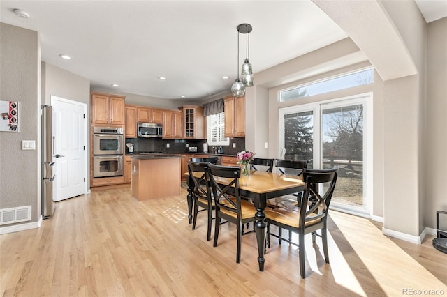 6690 S Fenton St, Littleton, CO 80123 - dining area featuring visible vents, recessed lighting, light wood-style flooring, and baseboards