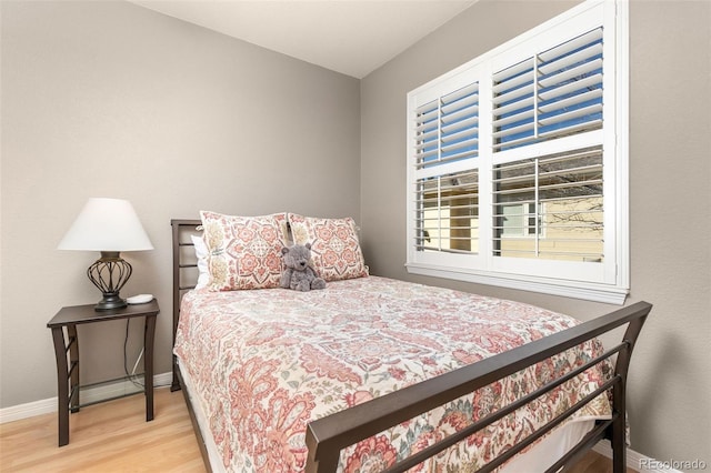 6690 S Fenton St, Littleton, CO 80123 - bedroom with baseboards and wood finished floors