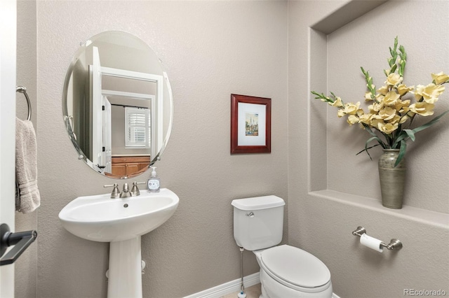 6690 S Fenton St, Littleton, CO 80123 - half bathroom featuring toilet