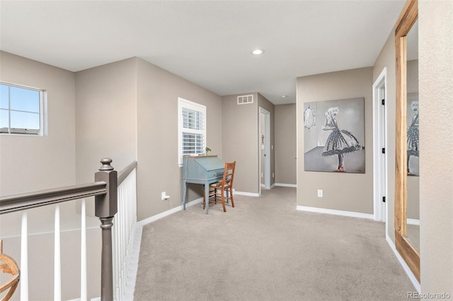 6690 S Fenton St, Littleton, CO 80123 - hallway with visible vents, carpet flooring, baseboards, and an upstairs landing