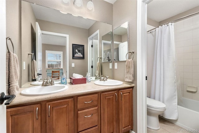 6690 S Fenton St, Littleton, CO 80123 - full bath with double vanity, a sink, shower / tub combo, and toilet