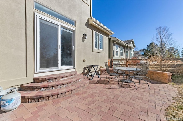 6690 S Fenton St, Littleton, CO 80123 - view of patio featuring outdoor dining area and entry steps