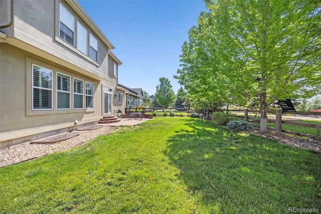 6690 S Fenton St, Littleton, CO 80123 - view of yard featuring a patio area and entry steps