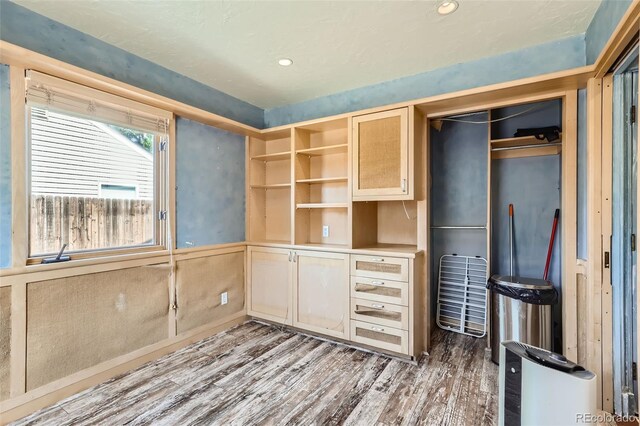 interior space with hardwood / wood-style floors