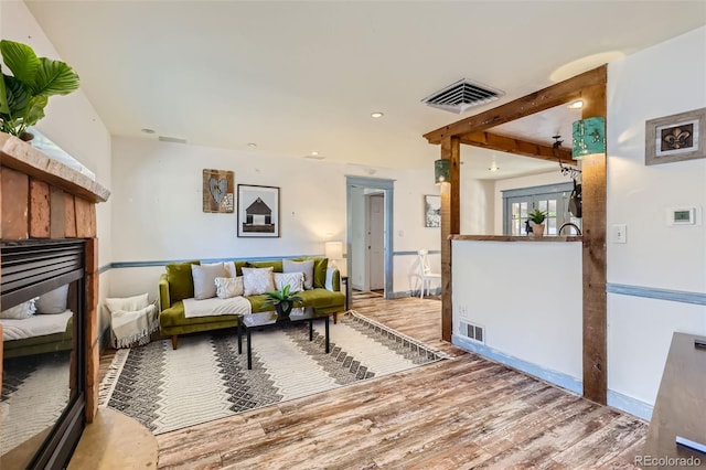 living room featuring wood-type flooring