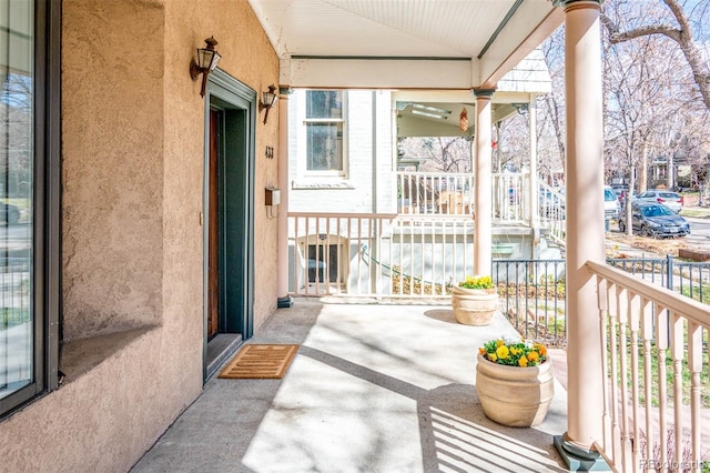 balcony featuring a porch
