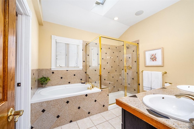 full bath with tile patterned floors, a stall shower, a bath, double vanity, and vaulted ceiling