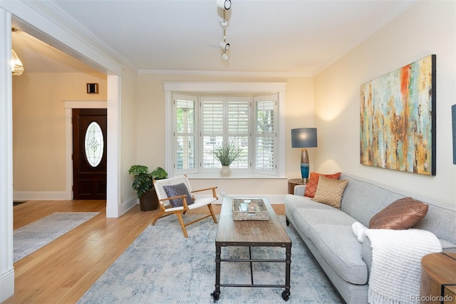433 N Ogden St, Denver, CO 80218 - living area with wood finished floors, ornamental molding, and baseboards