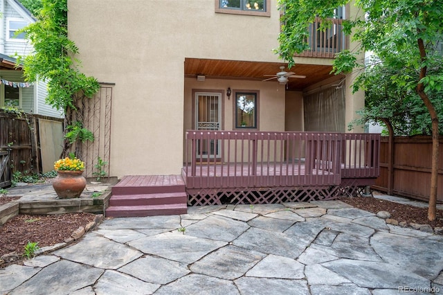 433 N Ogden St, Denver, CO 80218 - view of exterior entry featuring stucco siding, ceiling fan, and a patio area
